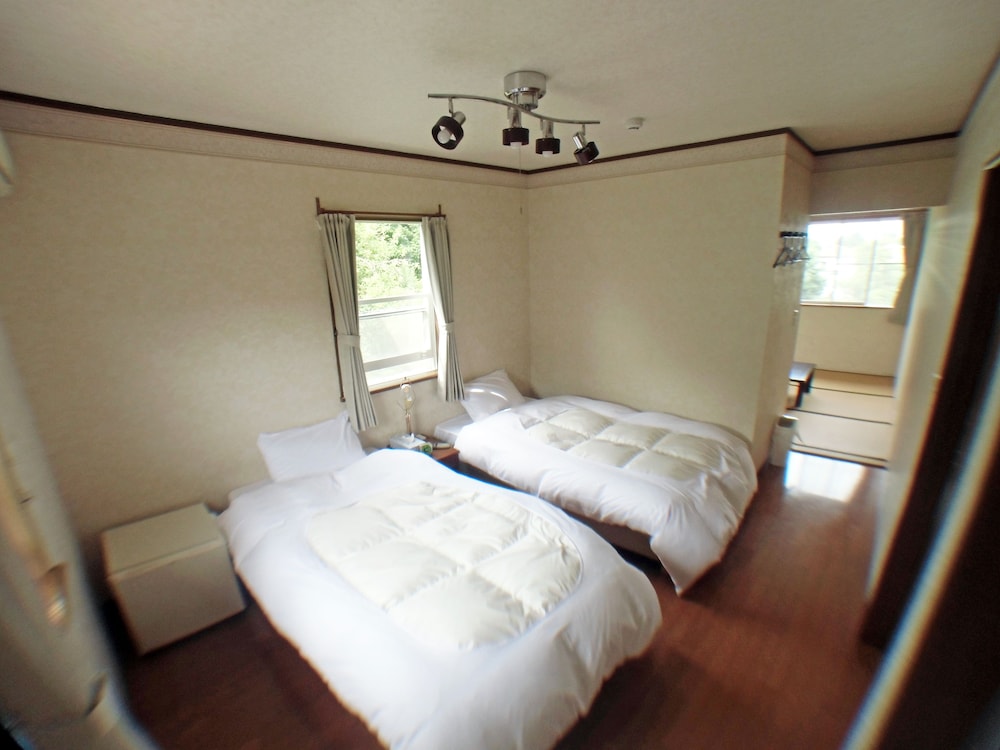 ツインルーム シングルベッド 2 台 禁煙 オーシャンビュー | B&B ゲストハウス輪の宿