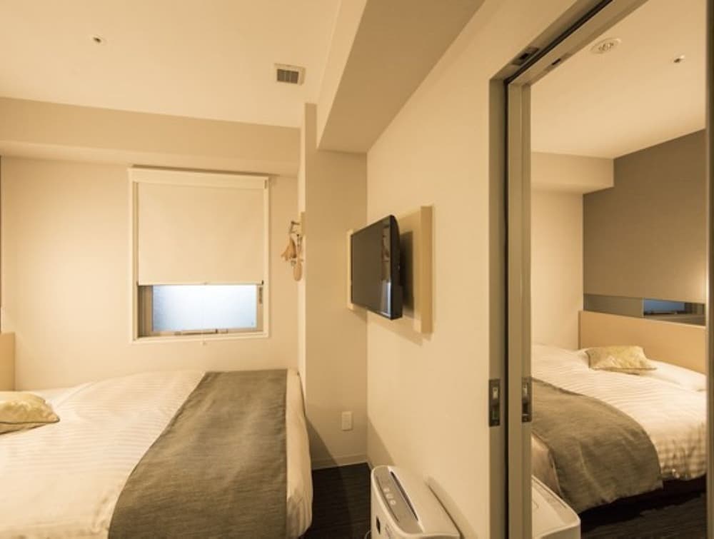 コネクティングルーム 客室2 | スーパーホテル Premier 大阪本町駅前