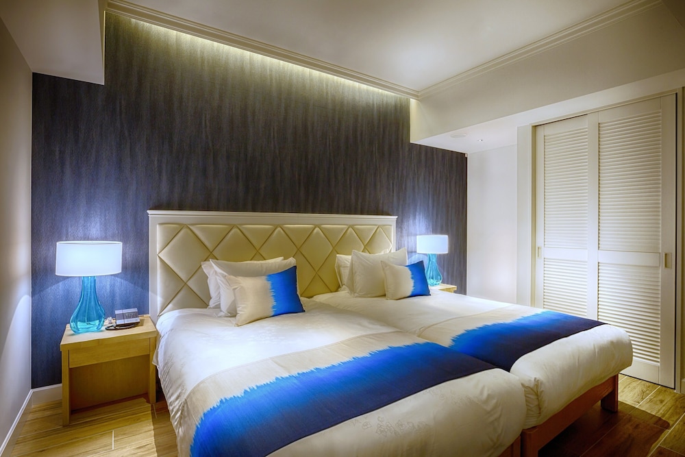 ミラージュフロア デラックススイート 1ベッドルーム【ラウンジアクセス付き】 客室1 | ホテルシギラミラージュ