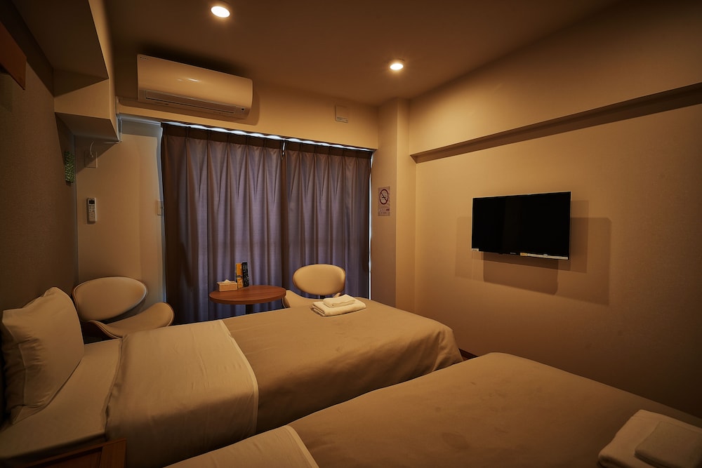 ツインルーム 禁煙 客室10 | アルセ琉球 ハーバーステイ