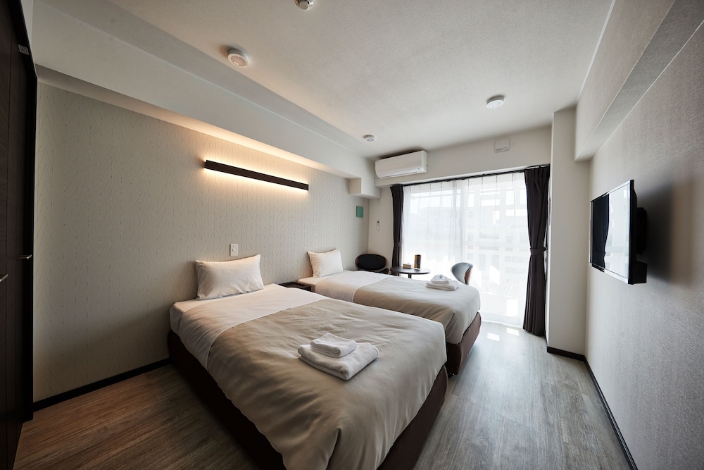 ツインルーム 禁煙 客室14 | アルセ琉球 ハーバーステイ