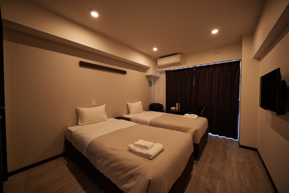 ツインルーム 禁煙 客室19 | アルセ琉球 ハーバーステイ