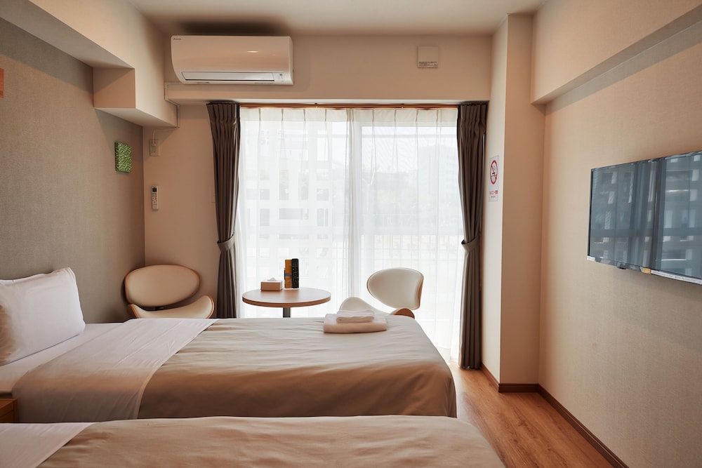 ツインルーム 禁煙 客室11 | アルセ琉球 ハーバーステイ