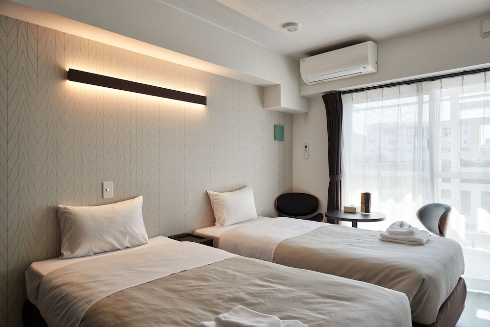 ツインルーム 禁煙 客室16 | アルセ琉球 ハーバーステイ