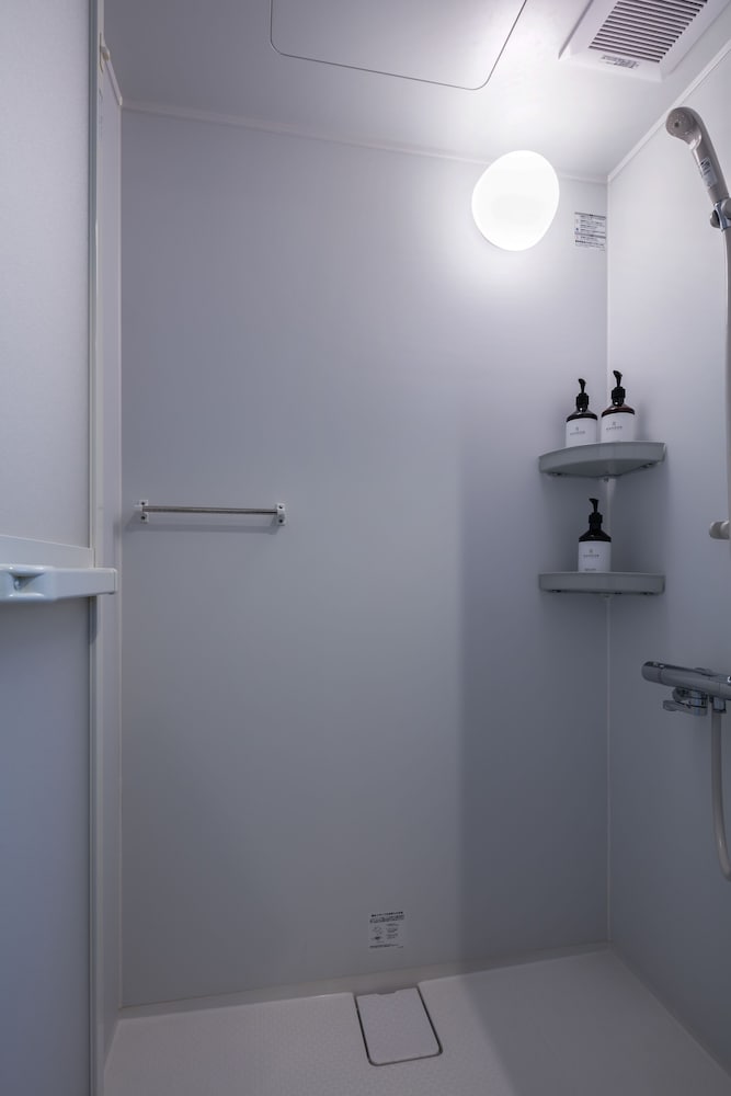 プレミアム スイート ベッドルーム (複数) シティビュー バスルームのシャワー0 | ランドーレジデンスすすきのスイーツ