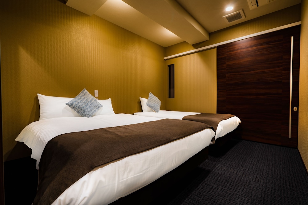 プレミアム スイート ベッドルーム (複数) シティビュー 客室3 | ランドーレジデンスすすきのスイーツ