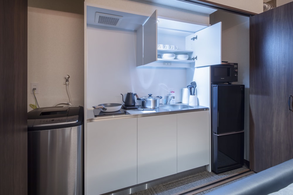 エグゼクティブ スイート ベッド (複数台) 禁煙 スパ浴槽 専用キッチン0 | ランドーレジデンス広島スイーツ