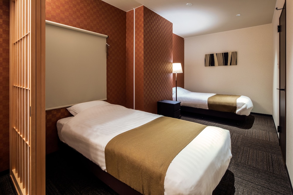 エグゼクティブ スイート ベッド (複数台) 禁煙 スパ浴槽 客室0 | ランドーレジデンス広島スイーツ