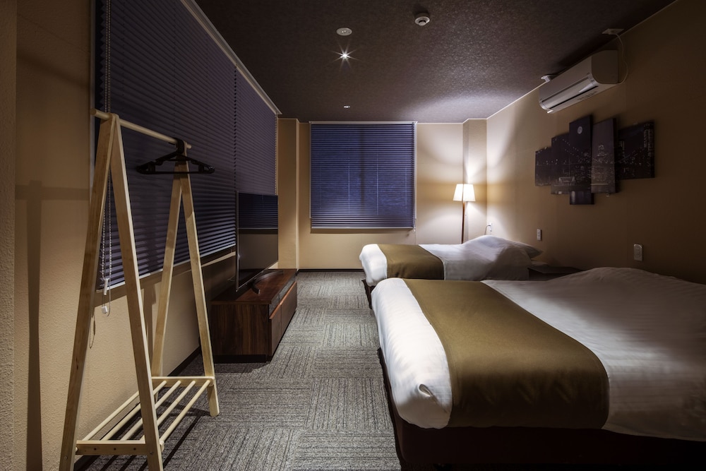 プレジデンシャル スイート ベッド (複数台) 禁煙 スパ浴槽 客室0 | ランドーレジデンス広島スイーツ