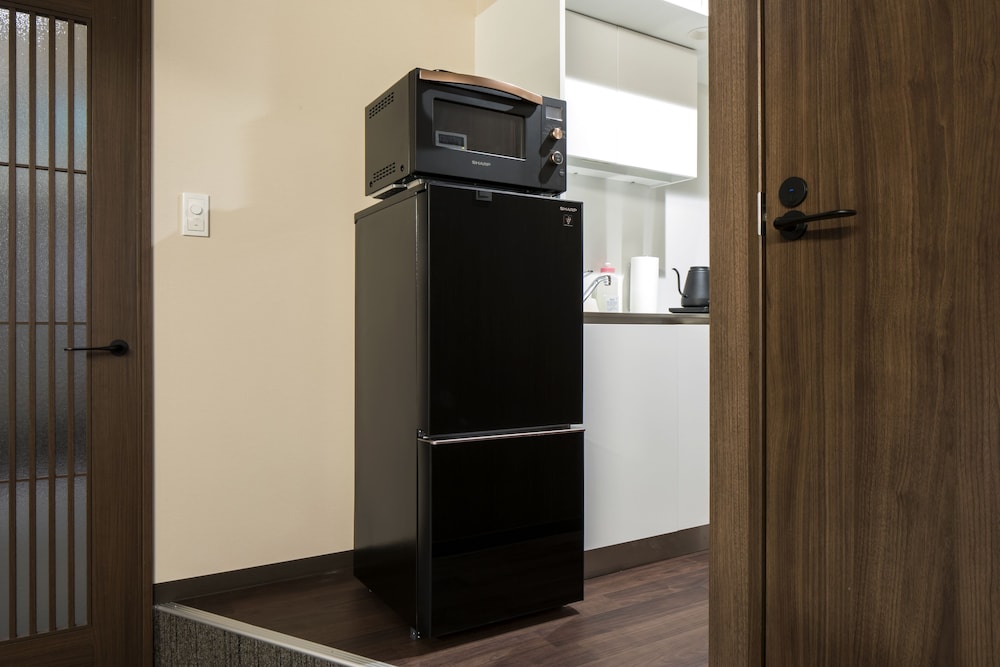 プレジデンシャル スイート ベッド (複数台) 禁煙 スパ浴槽 専用キッチン1 | ランドーレジデンス広島スイーツ