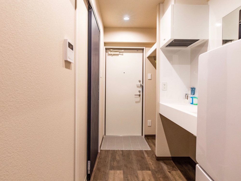 ベーシック ダブルルーム ダブルベッド 1 台 禁煙 | CONDOMINIUM HOTEL Riyuka in KADENA 1