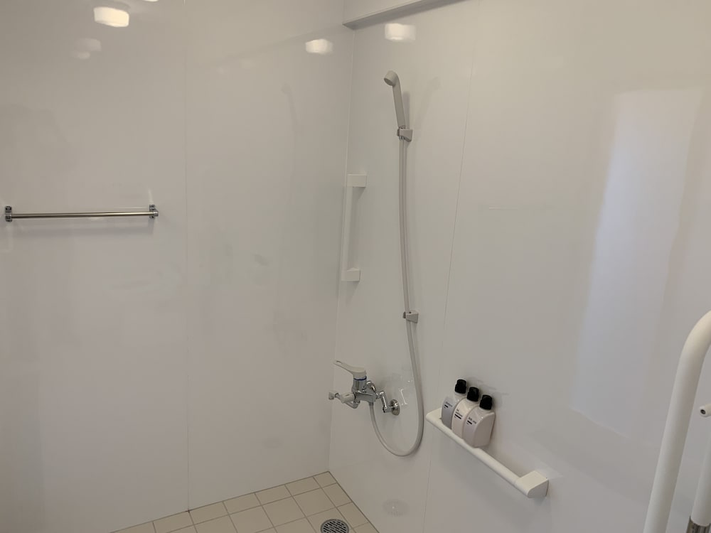 ベーシック ダブルルーム ダブルベッド 1 台 禁煙 バスルーム0 | CONDOMINIUM HOTEL Riyuka in KADENA 1