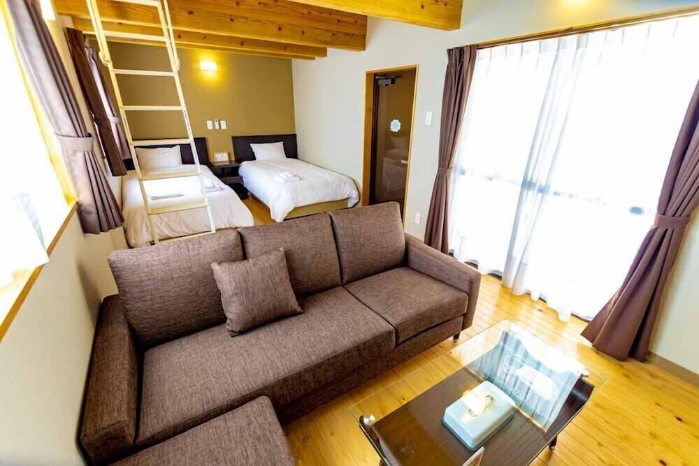 ファミリー コテージ リビング エリア0 | ビーチリゾーツホテルカラカウア