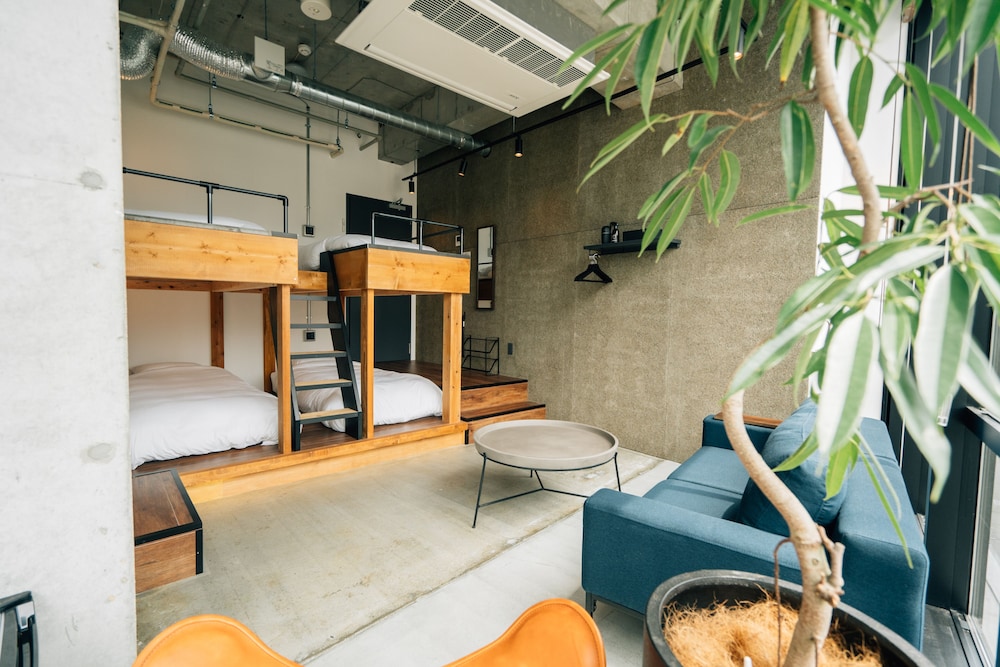 デラックスルームリバービューII シングルベット4台 禁煙 客室1 | ゾンクホテル中洲であい橋