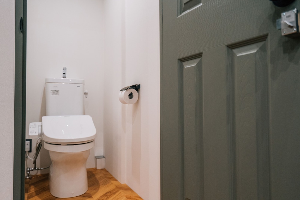 デラックストリプルルーム I ダブルベット3台 & ソファ1台 禁煙 客室1 | ゾンクホテル中洲であい橋