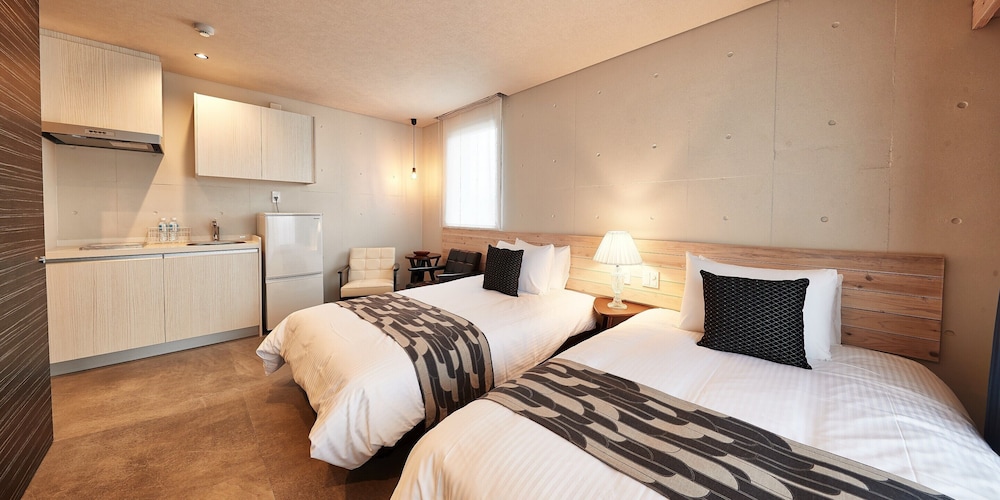 ベーシック ツインルーム ベッド (複数台) 客室4 | よみたんコンドホテル ND