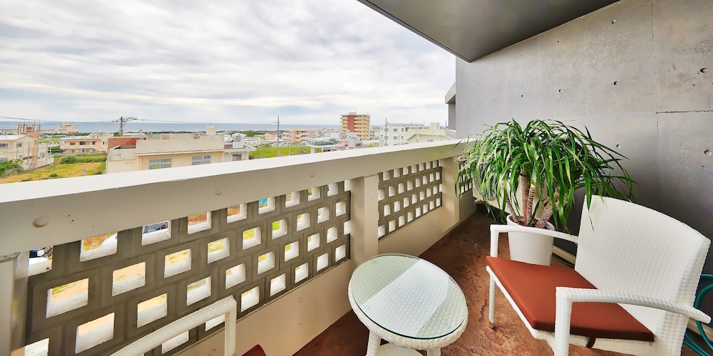 ベーシック ツインルーム ベッド (複数台) ビーチ / オーシャン ビュー0 | よみたんコンドホテル ND