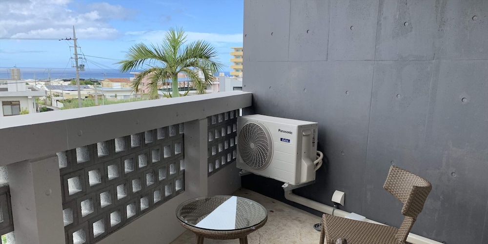 トリプルルーム ベッド (複数台) バルコニー0 | よみたんコンドホテル ND