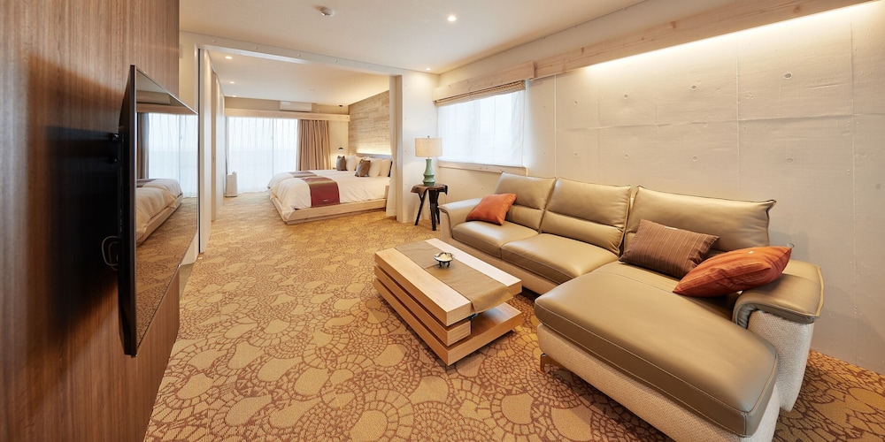 デラックス ツインルーム ベッド (複数台) | よみたんコンドホテル ND