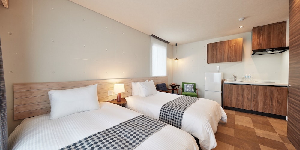 ベーシック ツインルーム ベッド (複数台) 客室5 | よみたんコンドホテル ND