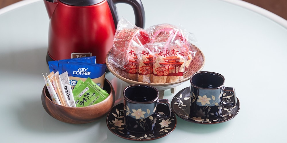 ベーシック ツインルーム ベッド (複数台) 客室の設備とサービス3 | よみたんコンドホテル ND