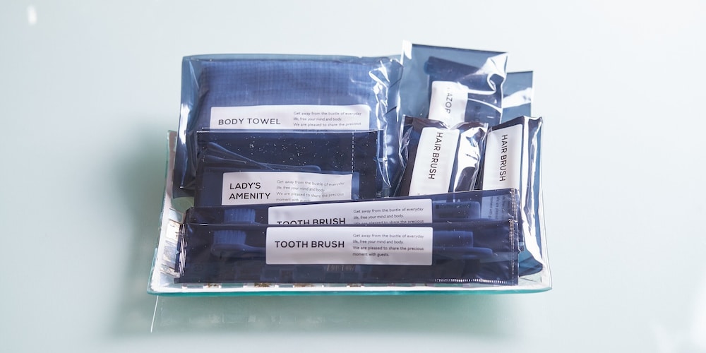 ベーシック ツインルーム ベッド (複数台) 客室の設備とサービス1 | よみたんコンドホテル ND