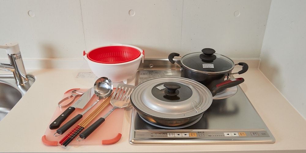 ベーシック ツインルーム ベッド (複数台) 客室の設備とサービス4 | よみたんコンドホテル ND