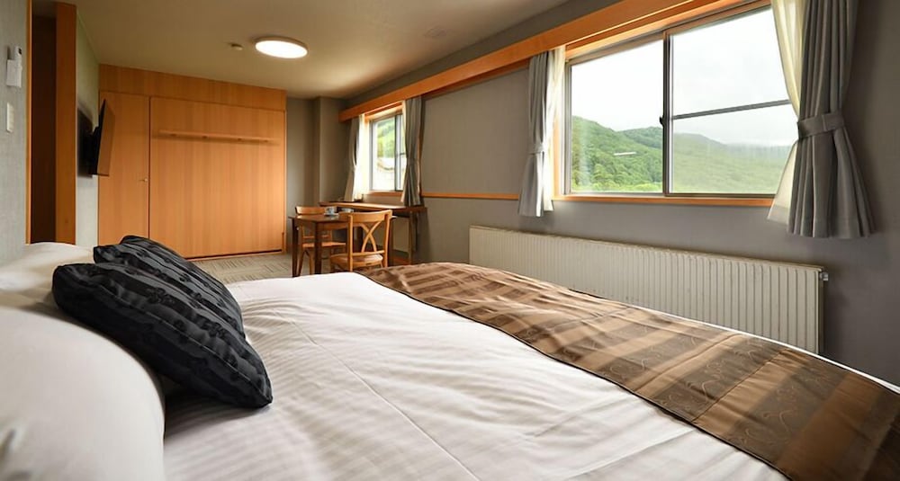 デラックス ルーム | ホテルタキモト