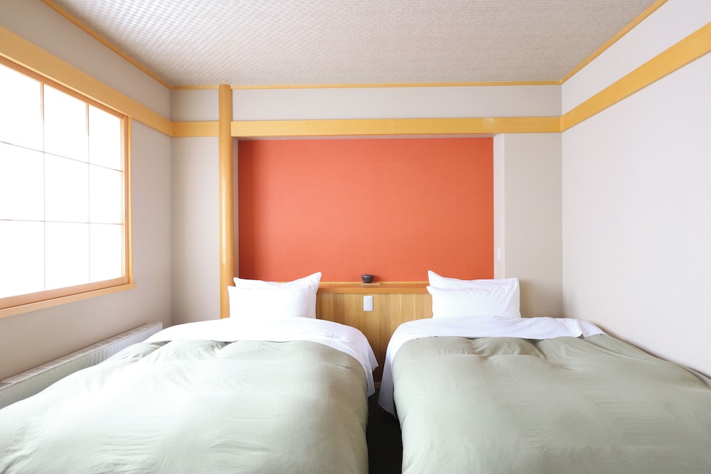 デラックス ルーム 客室1 | ホテルタキモト