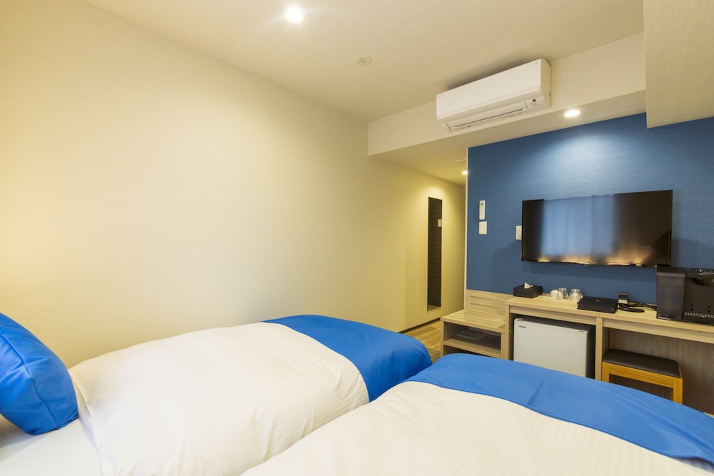 スタンダード ツインルーム ベッド (複数台) | ホテルランタナ 那覇国際通り