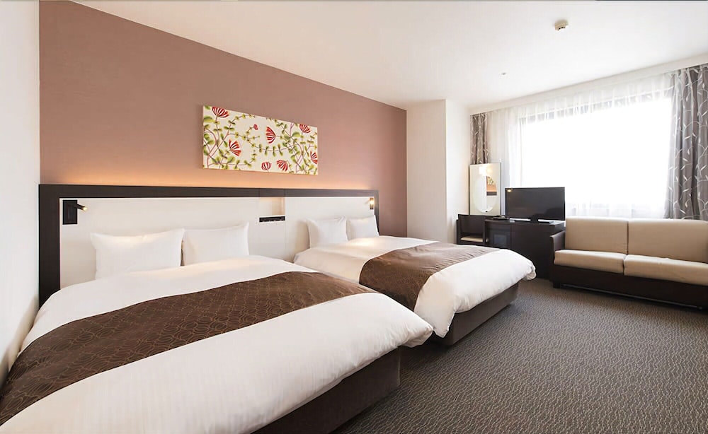 デラックス ツインルーム ダブルベッド2台 禁煙 | 大阪空港ホテル