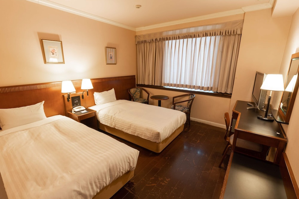 ラージツインルーム 喫煙可 客室1 | ホテルキャッスルイン津