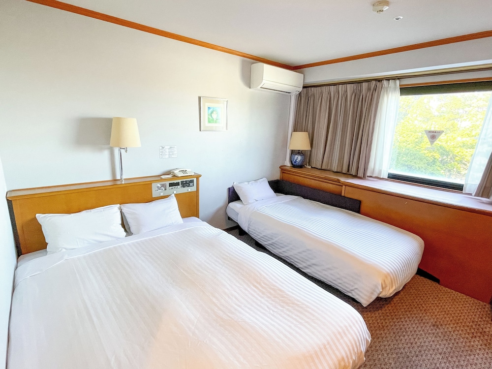 ラージダブルルーム 喫煙可 客室2 | ホテルキャッスルイン伊勢