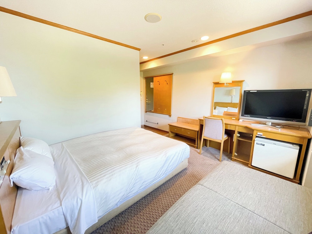 ラージダブルルーム 喫煙可 客室1 | ホテルキャッスルイン伊勢
