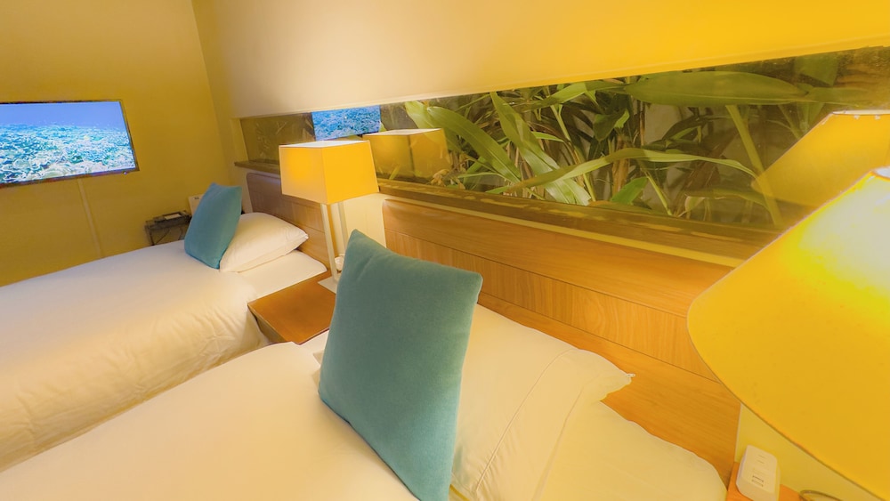 ツインルーム シングルベッド 2 台 バルコニー オーシャンビュー 客室6 | Kouriisland hotel cava