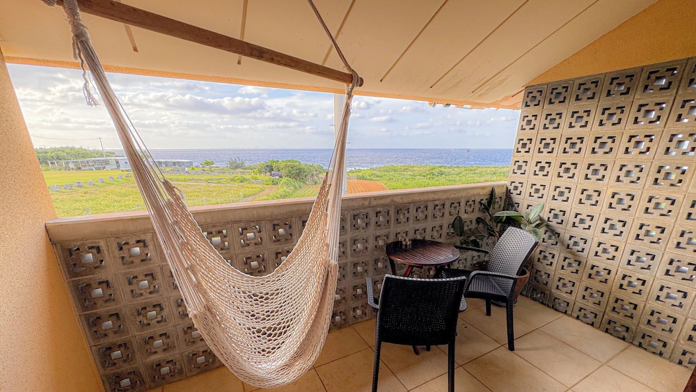 ダブルルーム クイーンベッド 1 台 バルコニー オーシャンビュー テラス / パティオ0 | Kouriisland hotel cava