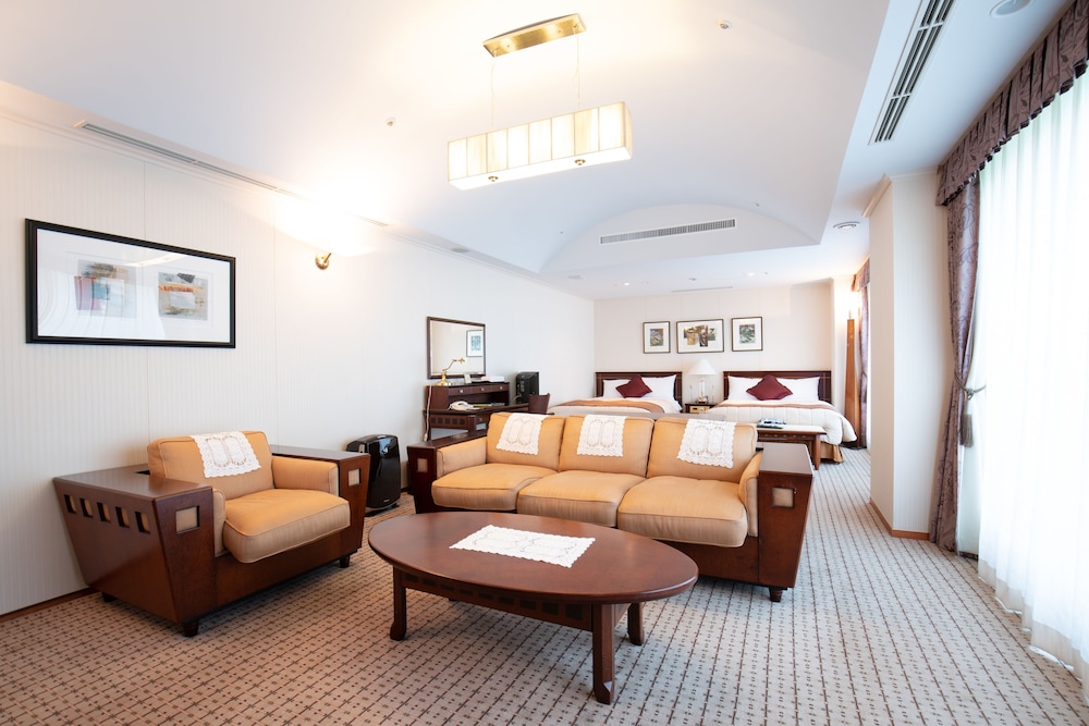 [禁煙] 洋室ラグジュアリーツイン リビング エリア0 | レンブラントプレミアム富士御殿場