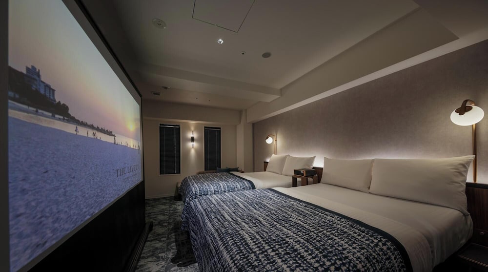 スーペリアツインルーム（プロジェクター付きシアタールーム） 客室6 | THE LIVELY 大阪本町 (ザ・ライブリー大阪本町)