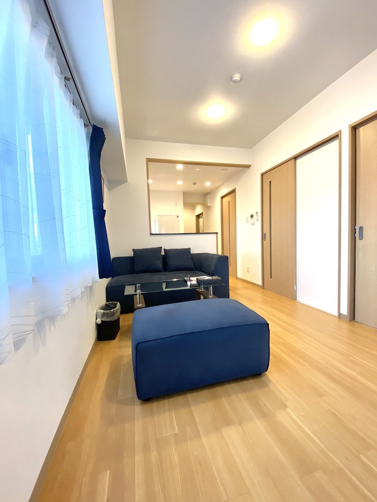 デラックス ルーム ダブルベッド 2 台 客室5 | M's Stay Okinawa