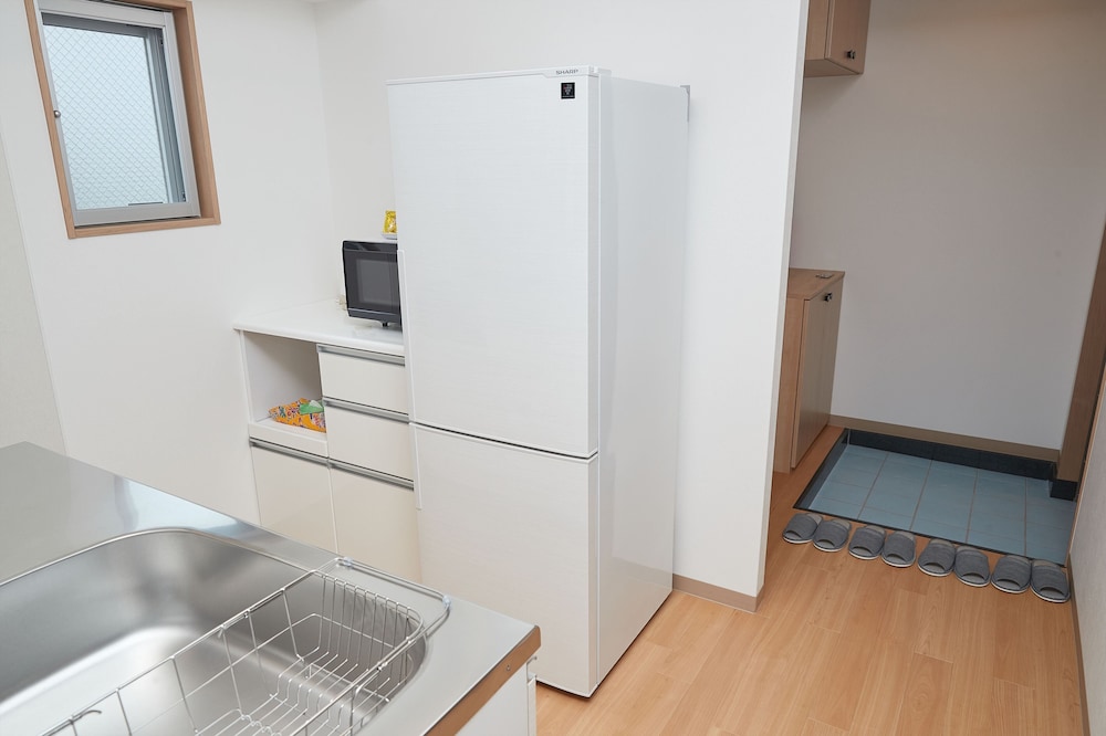 デラックス ルーム ダブルベッド 2 台 専用キッチン2 | M's Stay Okinawa