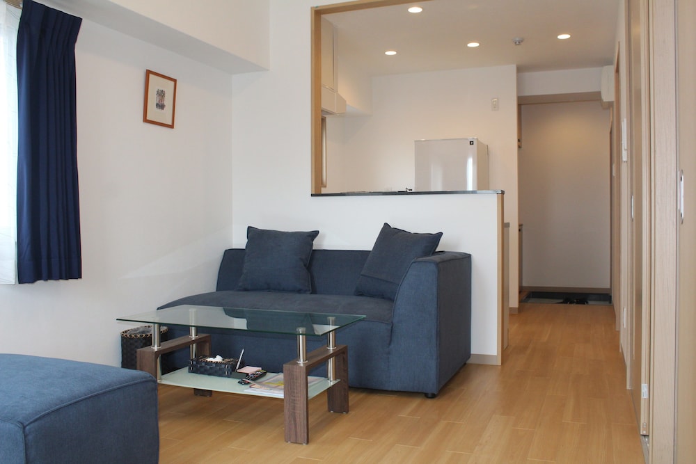 デラックス ルーム ダブルベッド 2 台 客室1 | M's Stay Okinawa