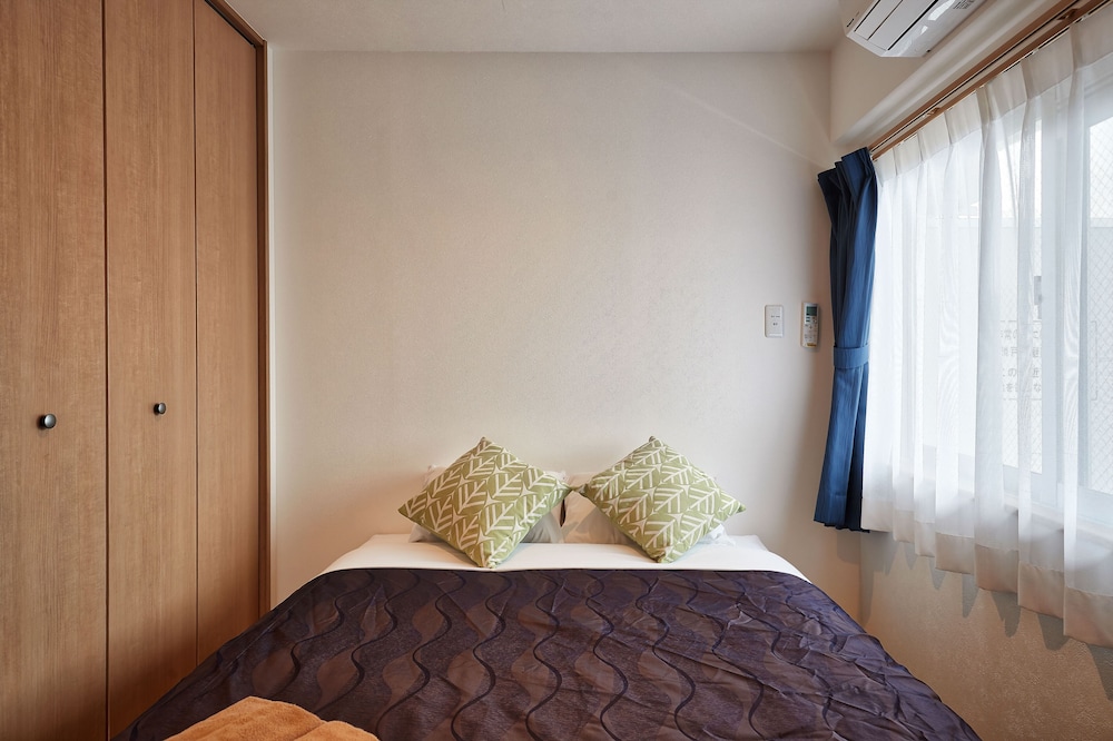 デラックス ルーム ダブルベッド 2 台 | M's Stay Okinawa