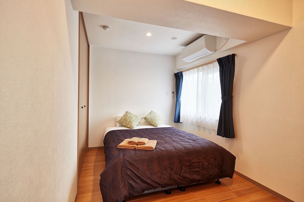 デラックス ルーム ダブルベッド 2 台 客室12 | M's Stay Okinawa
