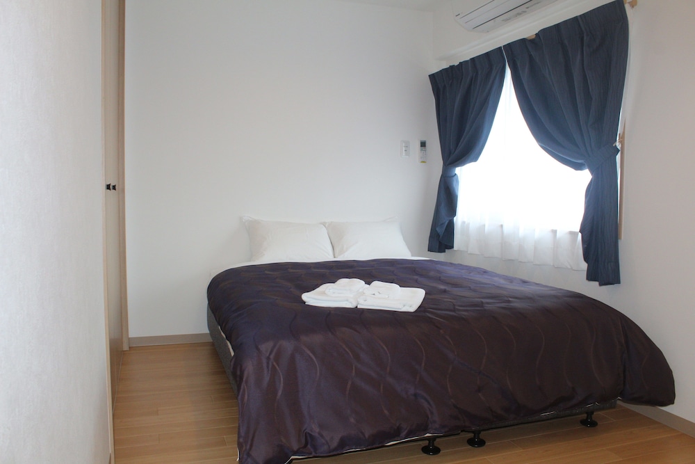 デラックス ルーム ダブルベッド 2 台 客室3 | M's Stay Okinawa