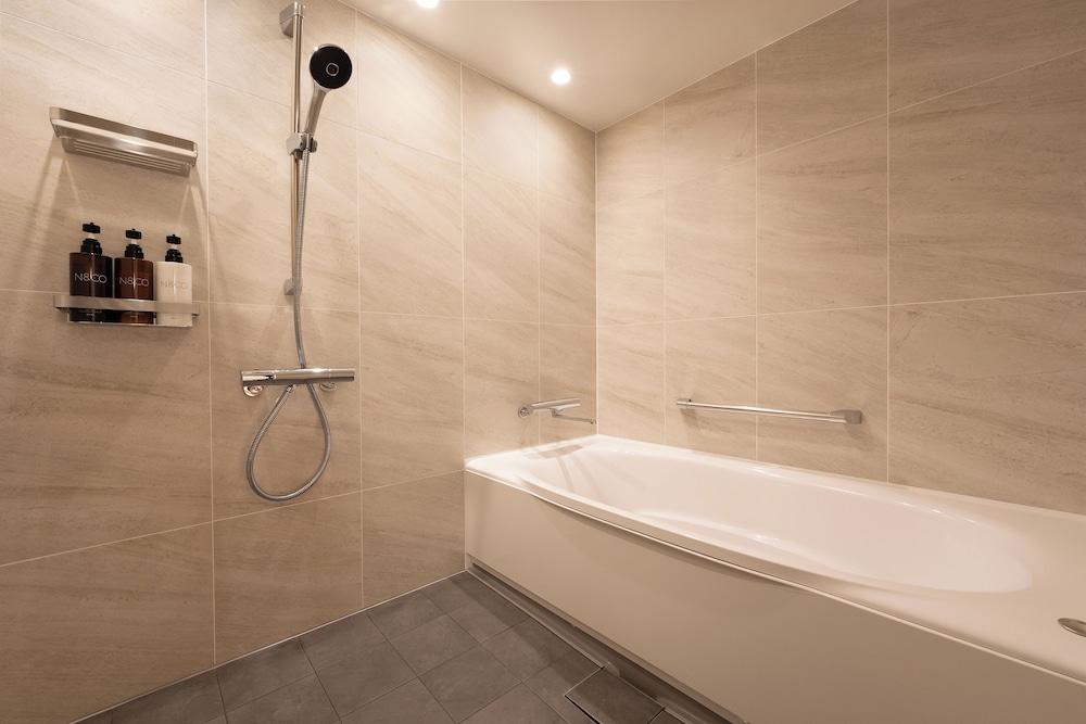 [2025リニューアル]クラブエグゼクティブツインルーム 禁煙 バスルーム1 | 沖縄ハーバービューホテル