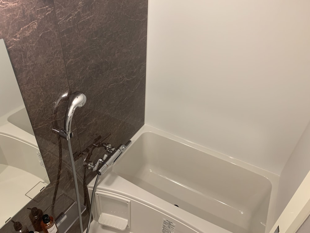 スタンダード ダブルルーム バスルーム0 | Mr.KINJO in TOMIGUSUKU