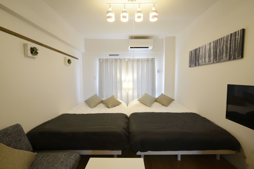 4名部屋 ホワイトモノトーン / WI 客室1 | オールステイ胡屋