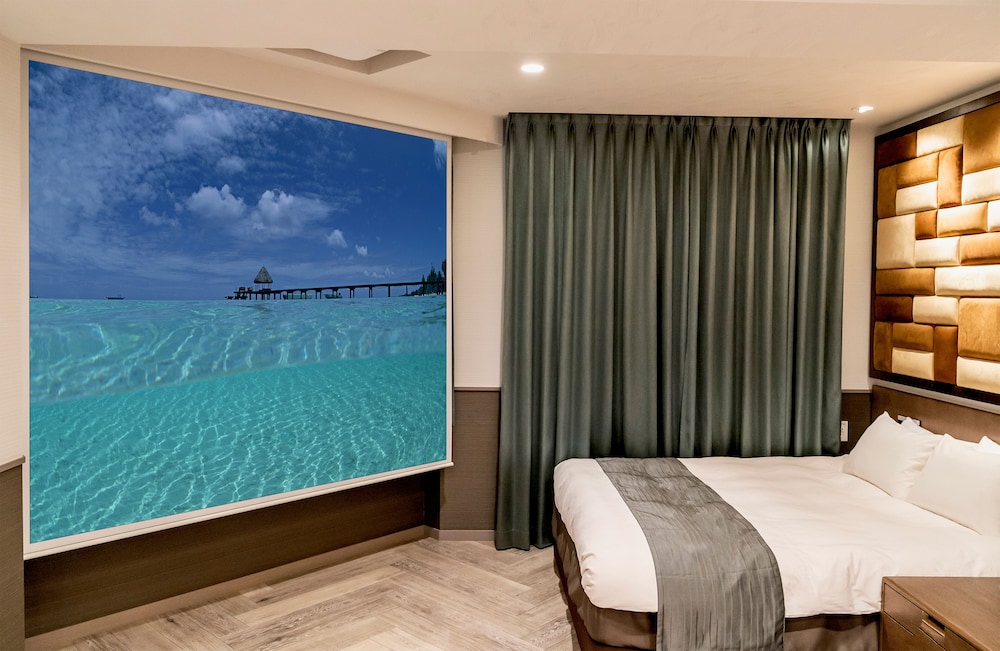 ファミリー ルーム ベッド (複数台) 禁煙 客室1 | ホテルパセラリビング