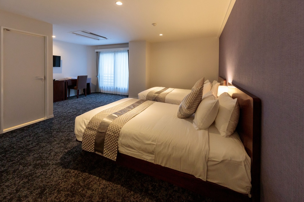 [禁煙] プレミアムツインB 33平米 (140cm幅ベッド1台 + 120cm幅ベッド1台) 客室2 | ホテル東京トリップ上野 西日暮里