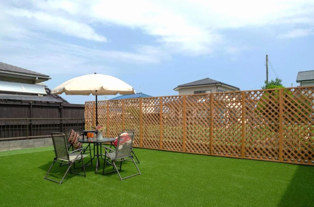 デラックス ハウス 禁煙 キッチン テラス / パティオ1 | Wave House 99